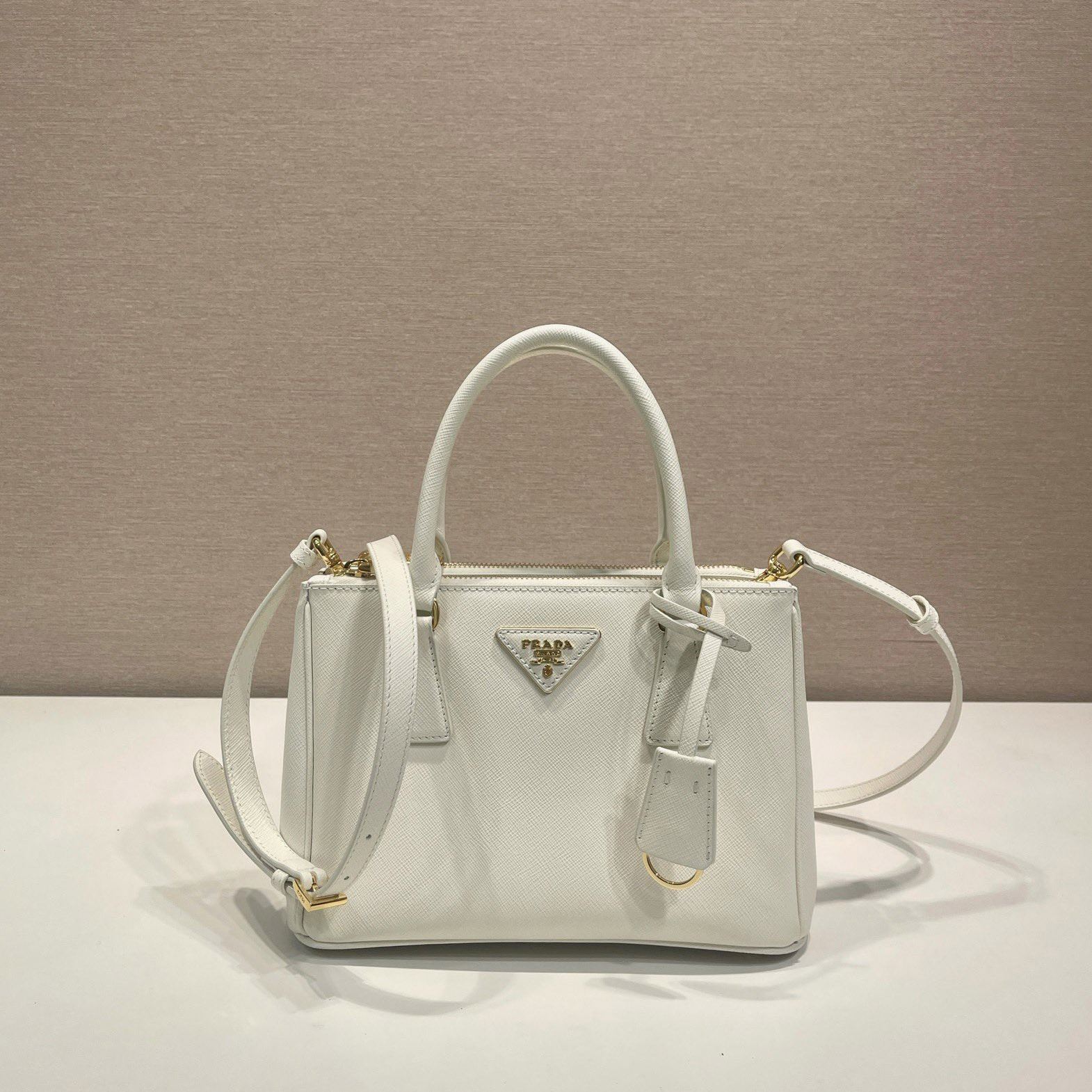 Pra*a top handle bags
